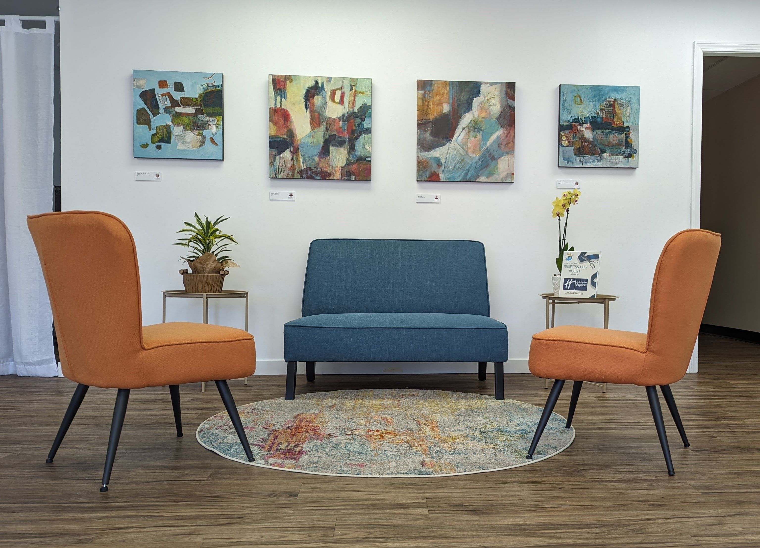 photo of the chamber business hub lounge with CV/Arts art